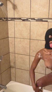 Showing off my ass to my fans while I shower!