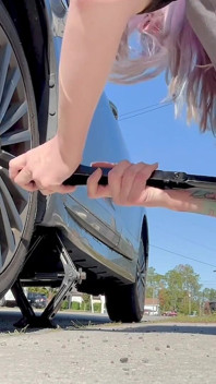 67 Tall Amazon Goddess Changes Her Tire - Big Feet in Frame