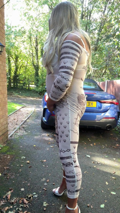 Sexy Crossdresser Kellycd2022 in Sexy White Jumpsuit and Heels