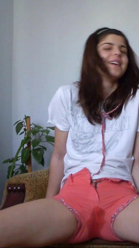 Sexy Teen Has Full Bladder and She Is Desperate to Pee so She Empty Her Bladder in Her Short Pants