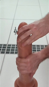 In the Bathroom Shoving the Dildos in My Ass