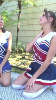 Cheerleaders Jenna Rose and Lilly Evans in outdoor lesbian action