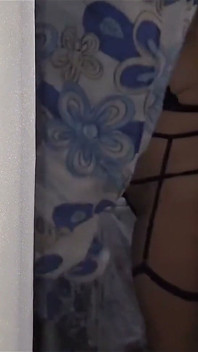 A Shameless Housewife Showing off to Passersby on the Street While Her Husband Is at Work