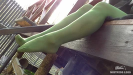 Goddess in Green Pantyhose Teases with Her Feet on the Porch
