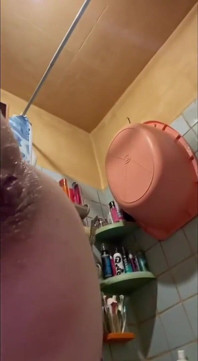 I Fuck Myself with a Dildo While Sitting in the Bathtub