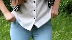 Diana Pee on a Rock in the Forest and Then She Dress Pulling up Her Tight Jeans