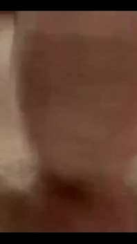 Masturbating