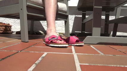 Lady Victoria Valente: Shoe play, toe wiggling, wrinkled soles on the garden terrace