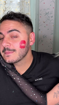 Red Lipstick Kisses Cover His Entire Face