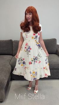 A Redhead in a Dress