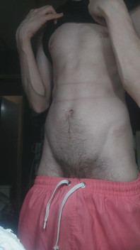 Skinny Boy Teasing His Abs on Camera