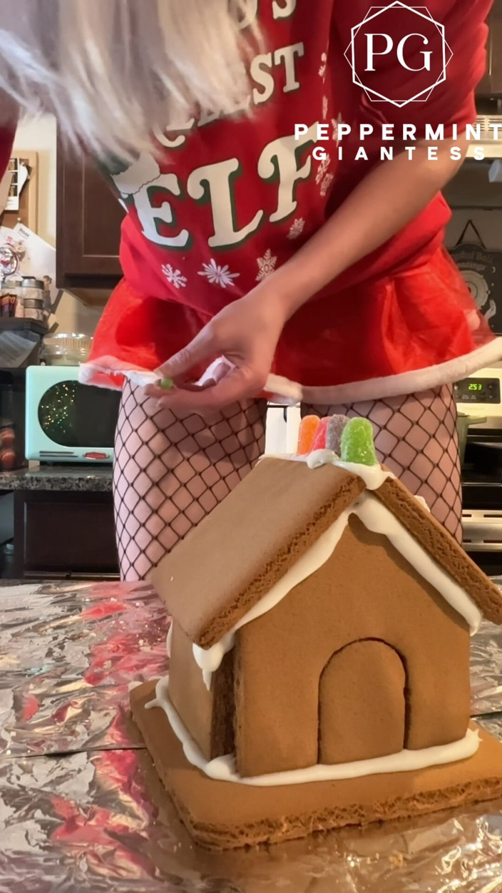 Peppermint Giantess: 73 Giantess in 8-inch Heels Decorates a Gingerbread Village
