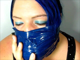 Selfgags classic: Layla makes herself another cruel, tight, and massive gag with 18...