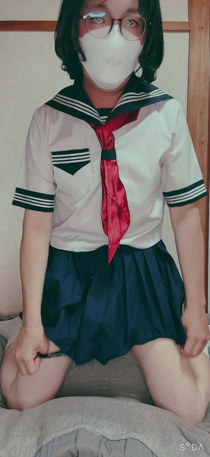 Madoka: A Masturbating Ladyboy in a Sailor Suit