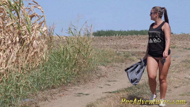 Pee Adventures: Pee standing on the ground on the road between the...