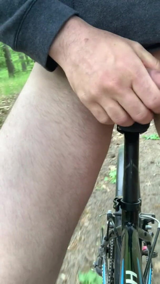 Apomit: Young boy on bike bottom naked ride in the forest