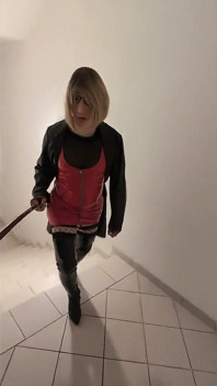 Public Walk in Parking House, Blonde in Overknee Boots, Red Pvc Dress and Long Leather Coat.