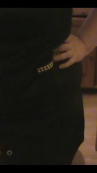 Robe-wearing Dominatrix