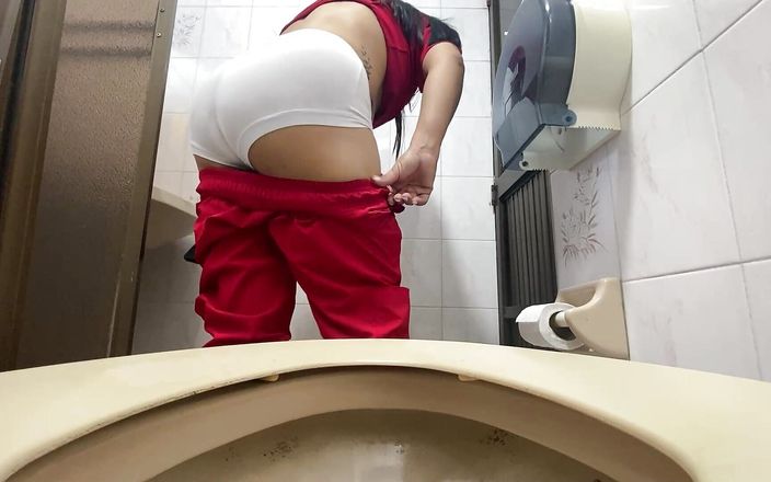 IRINA 69 STAR: Camera Captures Nurse Pissing in Public Bathroom