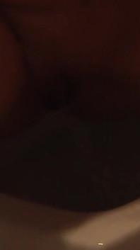 Blonde Babe in Red Lingery Pisses in Toilet and Thereafter Blows a Big Cock and Swallows Cum in the Shower