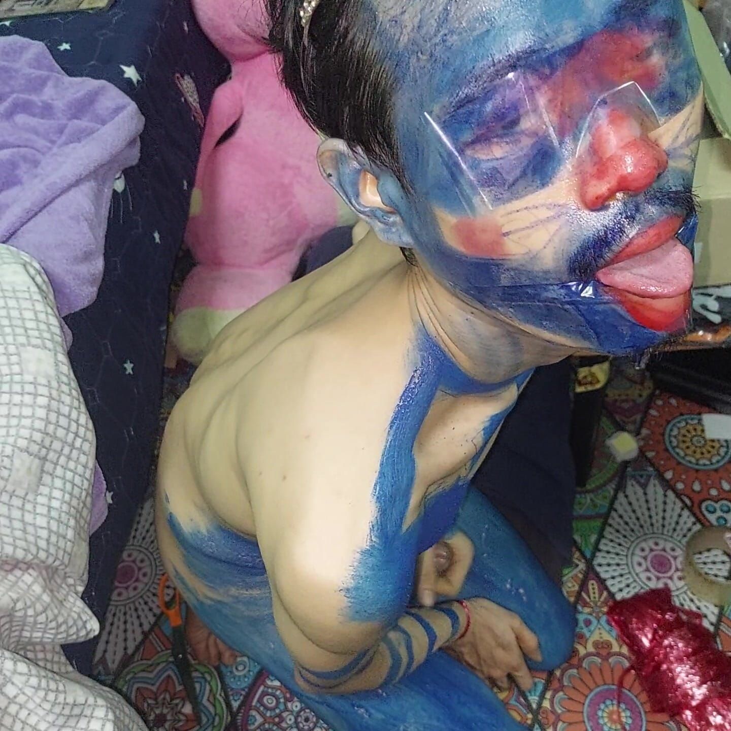 Masturbating in a Painted Suit