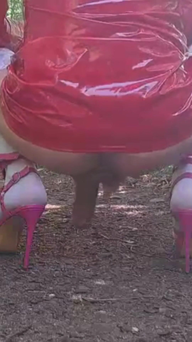 Exhibition in the Woods in Latex Outfit, Heel and White Stockings (Justine love)