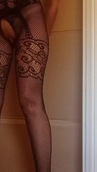 In a Nylon Catsuit and High Heels I Suck a Cock and Fuck It in a Gloryhole Until It Cums in My Mouth