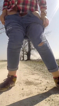 Desperate Babe with Full Bladder Empty Her Bladder and Pee on a Dirt Road