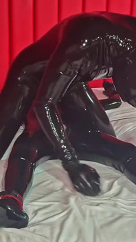 Latex Slave: Tied up on Bed - Alex Latex
