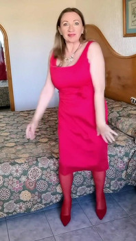 Hot MILF Teasing in Red Stockings and High Heels Shoes