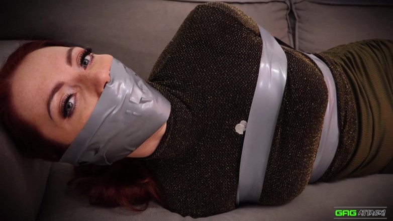 Gag Attack: Mila in tape bondage