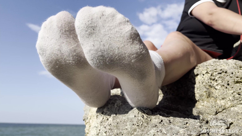 Mistress Legs: Sexy feet in dirty and terry white socks teasing on...