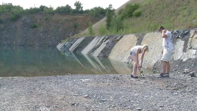 Reality Babes: Big titted blonde babe is posing by the lake