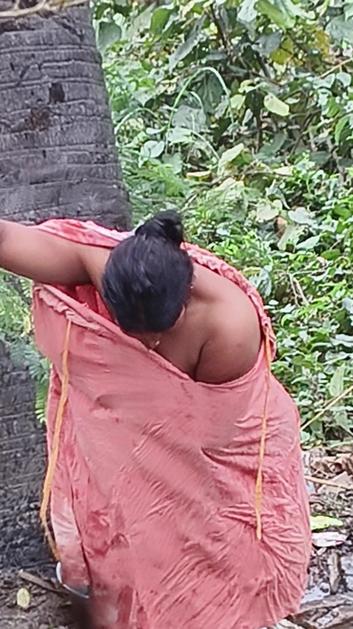 Indian aunty bathing outdoor
