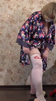 A Mature Wife Is Getting Ready for a Christmas Party and Trying on a Nurse's Uniform. Does She Want to Get Fucked There? PAWG.