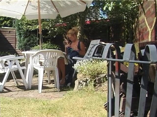 Lucky Cooch: Blonde milf showing off her boobs outdoors