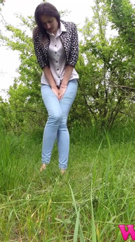Desperate Skinny Girl in Jeans Trying to Hold Her Pee in the Forest