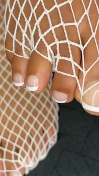 Ebony Girl Shows off Her Feet with French Pedicure in Her White Fishnets