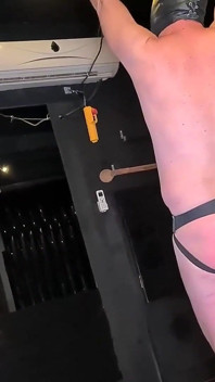Leather Mistress Canes the Slave