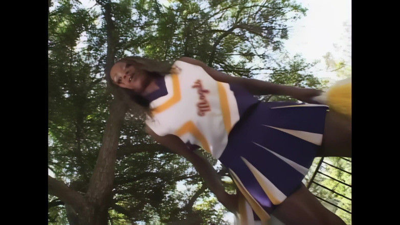 The Dark Side X: Black Cheerleader Has a Big Hard Cock for Her Wet...