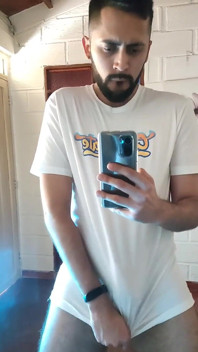 Jerking off and cumming through my white t-shirt