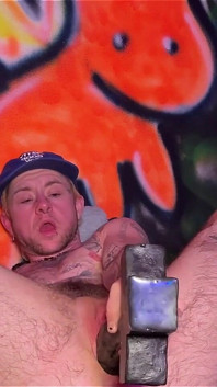 Tattooed Tboy XXX Skips Stretches His Pink Boy Pussy with an Xl Cross Dildo