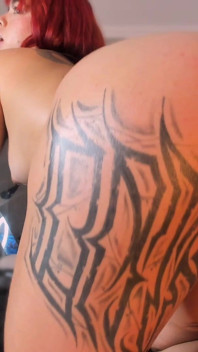 Latina Shakes Her Tattooed Butt