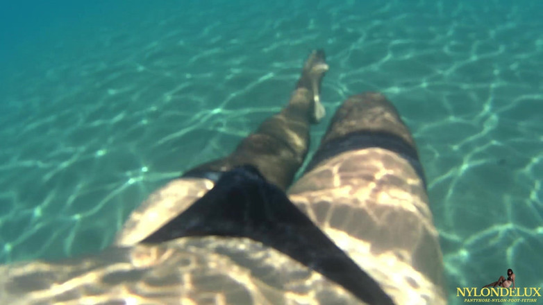 Nylondelux: Peniscage&amp;stocking in the Sea