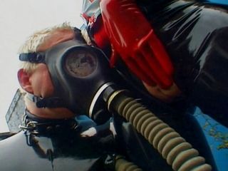 Thumbnail of Pussy licking in gas mask humiliating