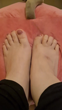 Freshly Painted and Oiled Toenails