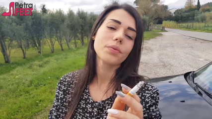 Smokin Fetish: Outdoors smoking cigar from sexy brunette