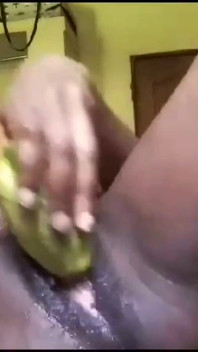 Black Slut Masturbates with Cucumber and Squirts