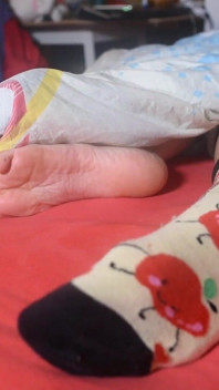 Twee footsie-meisjes in bed
