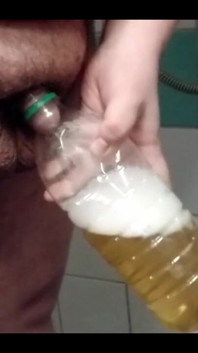 Superchub Pissing in Bottle